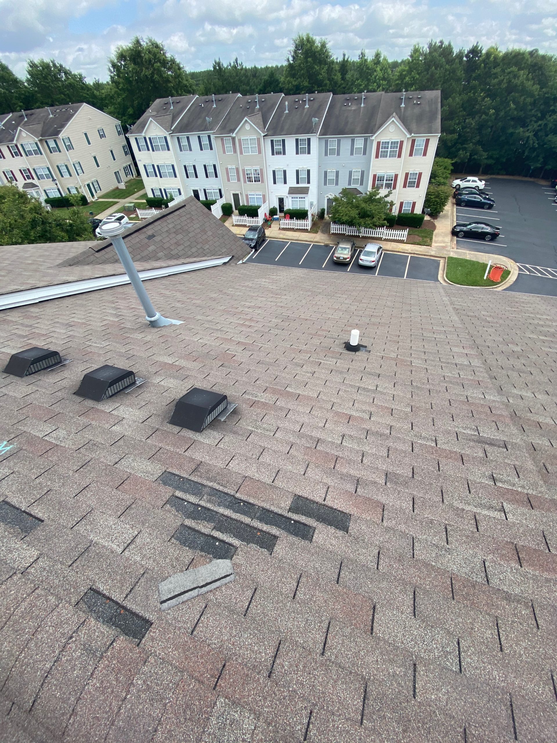 the shingle family roof replacement in raleigh townhome community