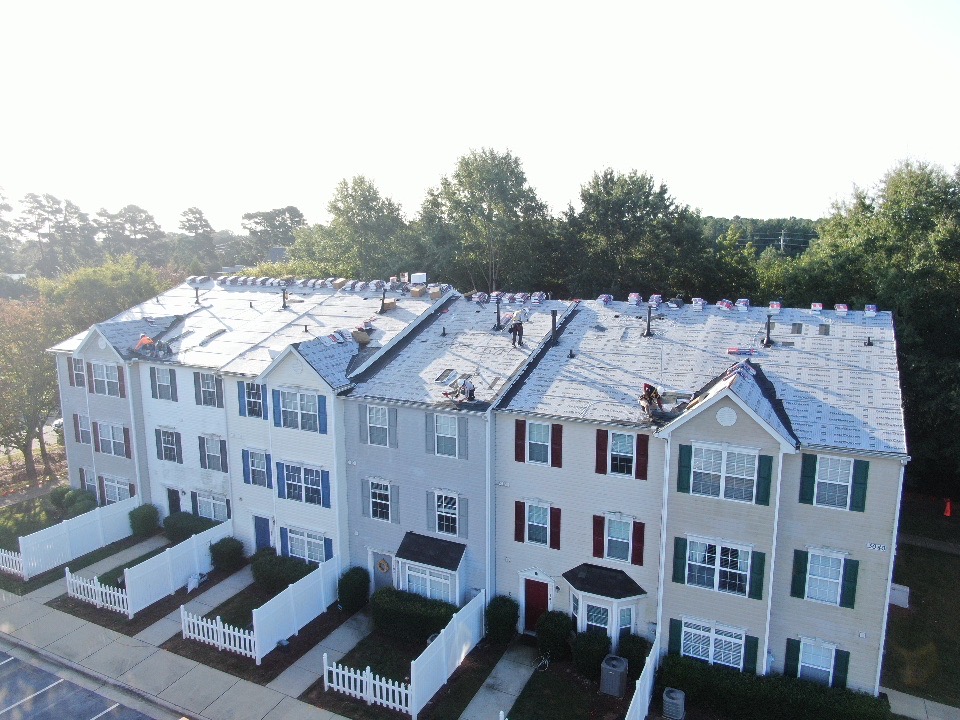 the shingle family roof replacement in raleigh townhome community