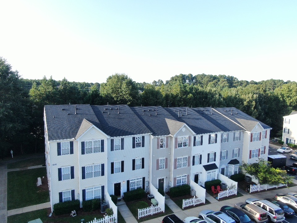 the shingle family roof replacement in raleigh townhome community