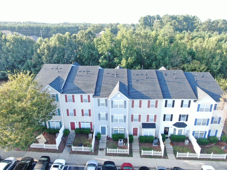 the shingle family roof replacement in raleigh townhome community