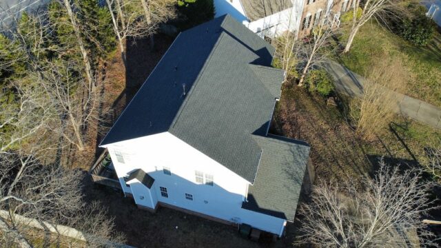 Loose Shingles to a New Roof - After