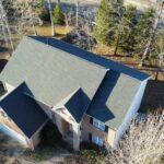Loose Shingles to a New Roof - After