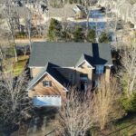 Loose Shingles to a New Roof - After